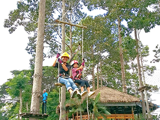 fly from treetop to treetop on a swing - Krabi Fun Park